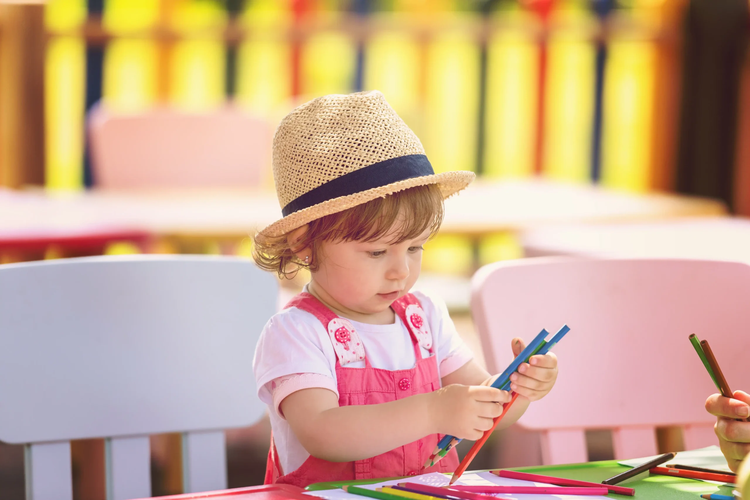 child-with-hat-drawing-with-colored-pencils-2026-03-17-19-44-46-utc - Copia